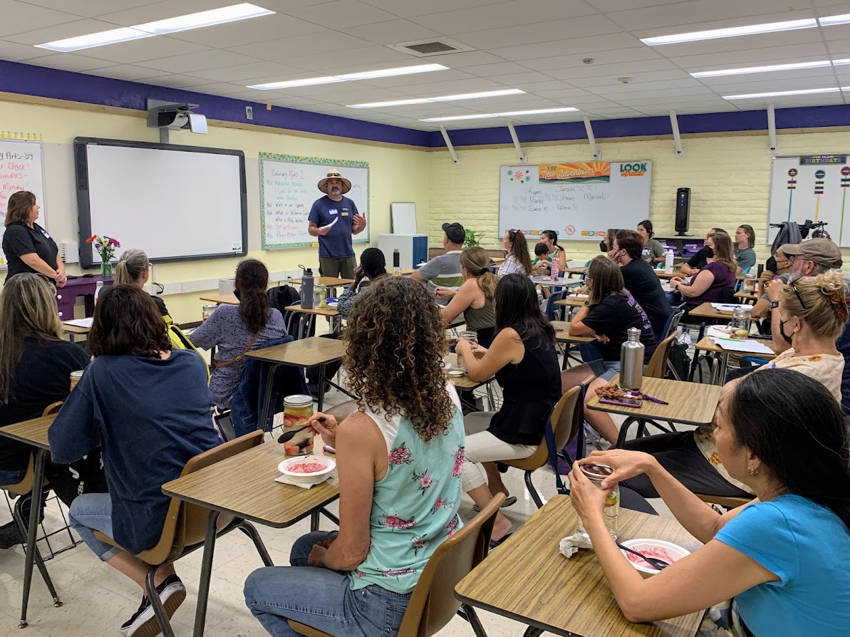 classroom with group listening to speaker