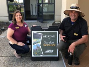 people with garden network sign